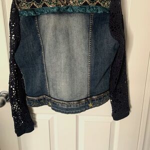 Exotic Jean Jacket Size 38. Length of sleeve 25 1/2” . 20” from back of neck to